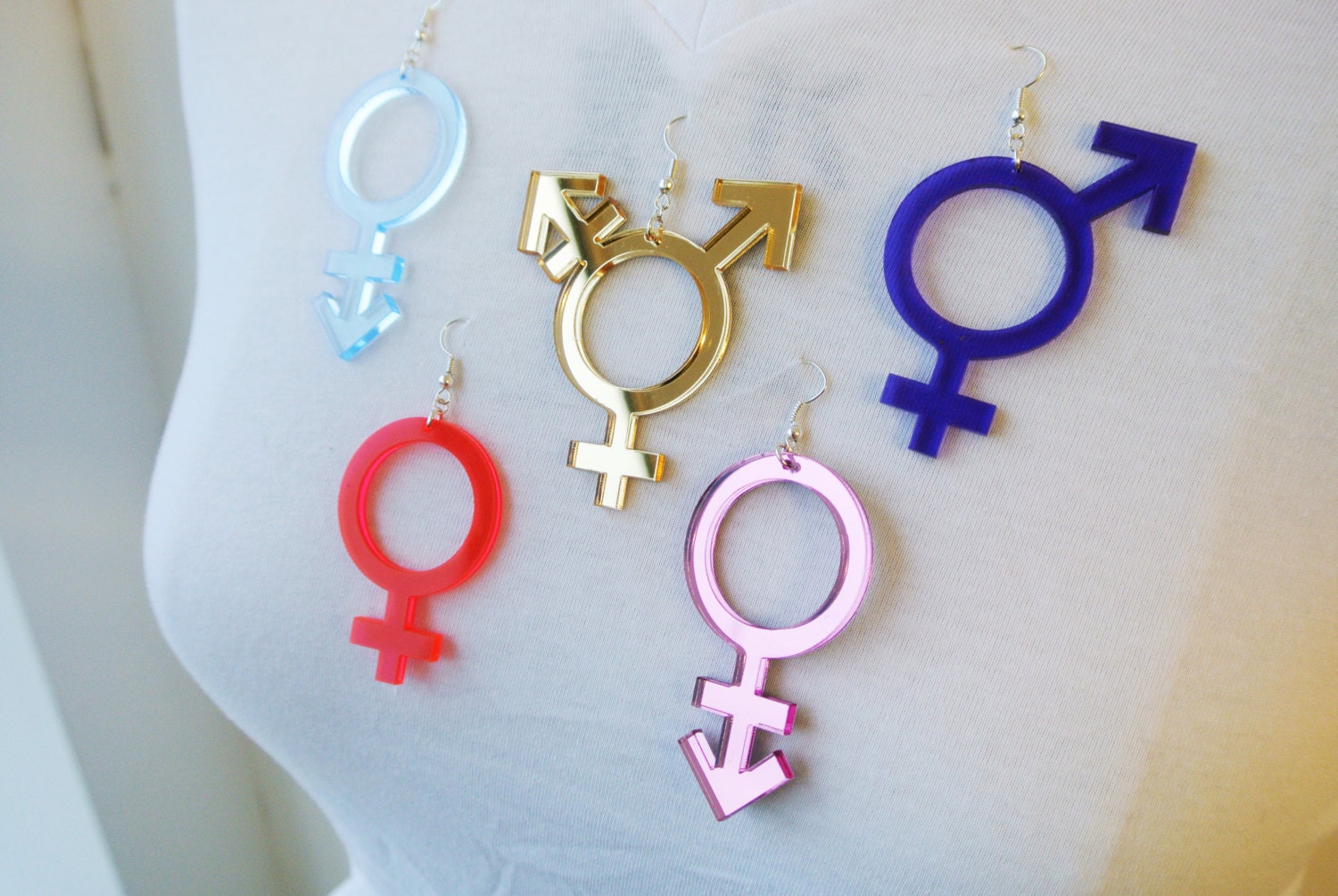 Woman on sale symbol earrings